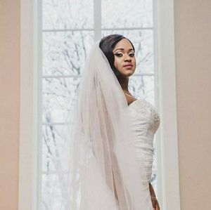 Wedding dress (original price $1200), medium petticoat ($75) and veil ($300)